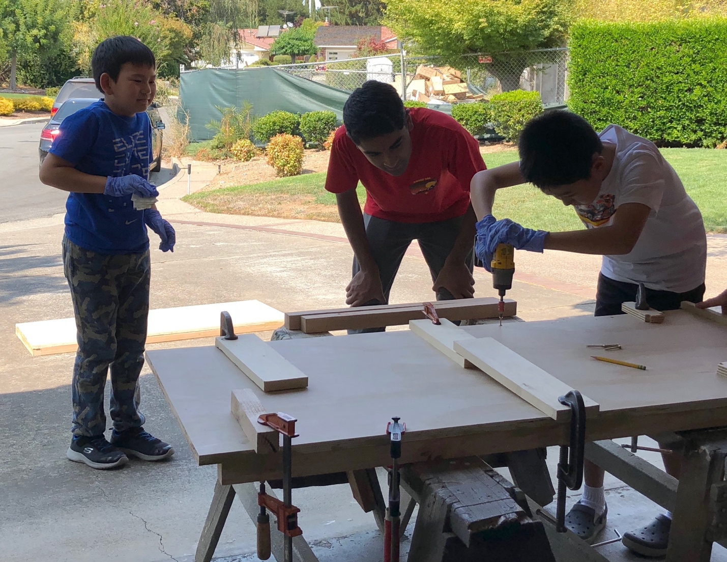 Teaching my Lego Robotics students how to use power tools.